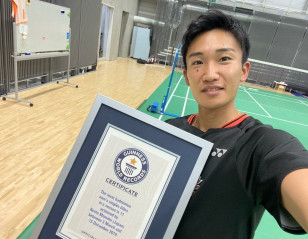 Momota Receives Guinness Honour